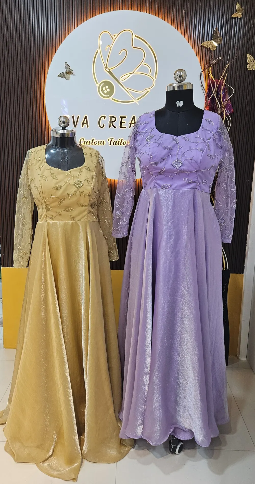 Lilac and gold gowns on mannequins
